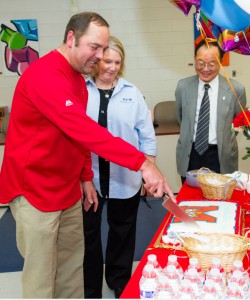 During a surprise party thrown for the principal of the year, Pearson celebrates with his colleagues.  Pearson’s work in crafting a warm, forward-thinking school was chief among his accomplishments when considered for the award. Courtesy of Donnie Biggs.