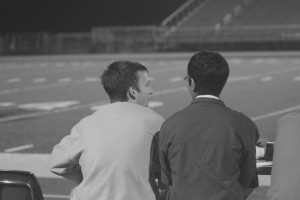 Seniors Karthik Dhanireddy and Brendan Baker keep the clock and book during a Varsity field hockey game. Baker was a  first-year manger with Dhanireddy this season. 