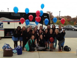 The varsity field hockey team wears custom-made spirit shirts on their way to the state tournament in November. The team wore their jerseys when they arrived at the competition and continued to sport matching apparel from spirit packs throughout the tournament. The apparel presented the team as a unified whole.