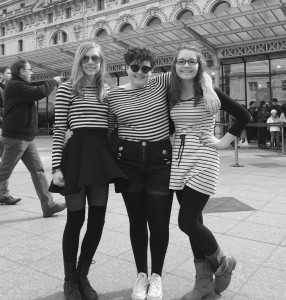 From left: senior Greta Schaaf, senior Claire Miller and junior Jayna Kirk hug in Paris during the art department’s 11-day trip through Europe.