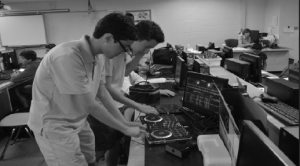 Sophomores and club co-presidents  Lawry Boyer and Bruce Stewart practice mixing their own music during Learn. The EDM club hopes to grow in the coming years.