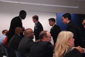 Juniors Paul Plawin, Sumaire Samuel and Peyton Lanier greet the judges prior to competing for the Pride and Passion Award. The team was made up of mostly upperclassmen, chosen by their teacher for their impressive understanding of the complex situations.