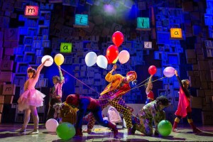 The Matilda ensemble takes the stage with colorful symbols of childhood wonder that are representative of the show’s themes.