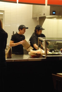 Senior Ben Hedda works as a cashier at his shift at the newly opened Chipotle located down Leesburg Pike. No locations in the Northern Virginia area were affected by E.Coli outbreaks.