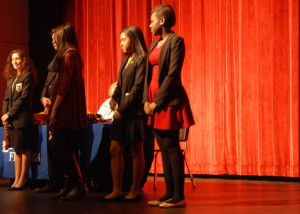 Senior Shima Wani waits on-stage at Falls Church high school where she was awarded second place in the Impromptu Speaking category