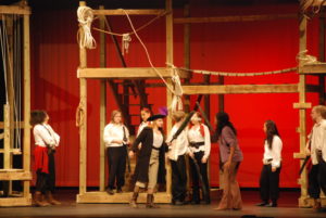 Junior Tanaka Muvavarirwa and senior Amelia Lindsay act out a fight scene in the theatre department's new shoe "The Sea Cook" written by former student Liz Carlson