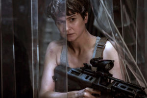 Main character Captain Daniels (Katherine Waterston) defends herself against the alien Xenomorph aboard the colony ship, the Covenant. 
