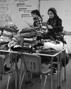 Sophomore and MSA member Humerya Ayaz, at the end of the designated week of the clothing drive, compiled all of the clothes in a classroom and began to catagorize, sort and bag them to be shipped to Syria. A variety of sizes and types of clothing were donated from the students and faculty. “I was so happy when we had an overflow of clothes donated on Friday,” junior Zainub Qureshi said. “We had so many clothes to sort through and bag, but it was definitely worth the pain of carrying them all.” 