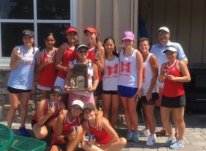 The girls varsity tennis team poses with their trophy after winning the Team State Title on June 5, their first win in this category. The team defeated the previous state champions, Deep Run High School. “This was a really big moment and we’re really excited to get rings and trophies,” sophomore and varsity tennis player Ashley Fitz-Patrick said. 