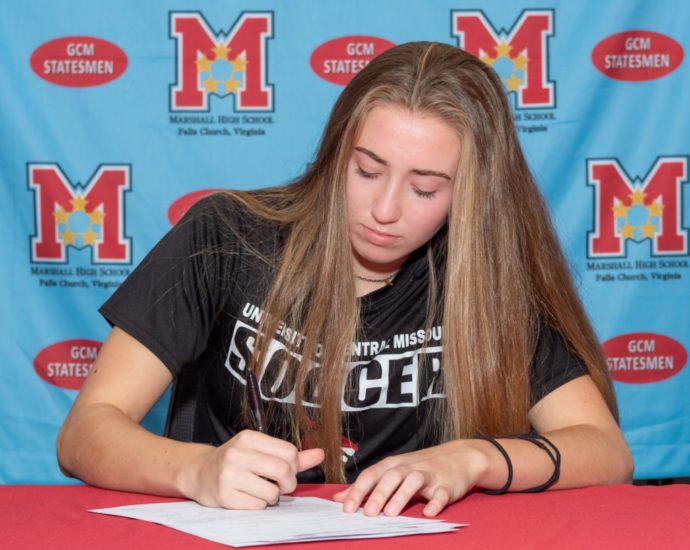 Rylie Hughes signs her letter of intent to play soccer at the University of Central Missouri on Nov. 10. Hughes and her teammates picked up their first win of the season on March 22 against Jefferson with a score of 4-2.