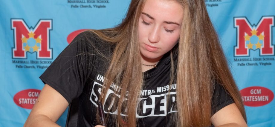 Rylie Hughes signs her letter of intent to play soccer at the University of Central Missouri on Nov. 10. Hughes and her teammates picked up their first win of the season on March 22 against Jefferson with a score of 4-2.