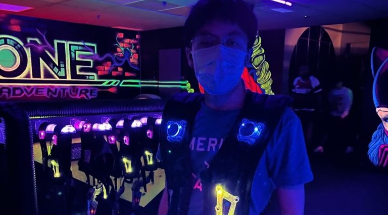 Junior David Tu poses at a laser tag event.